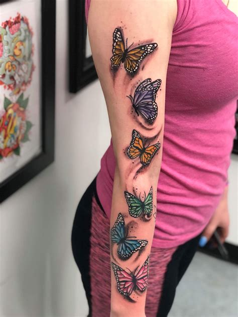 The realistic rose and butterfly tattoo has been a popular choice that has been designed on the shoulder of the woman that is giving her an absolutely stunning look. . Female butterfly tattoo arm sleeve